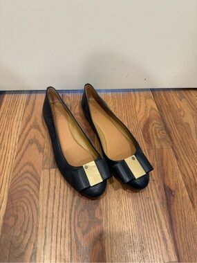 Tory Burch Navy Leather Flats with Gold Bow Detail